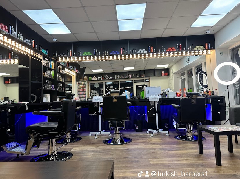 Inside Turkish Blade & Blend Barbers in Swords with modern barber chairs and LED-lit stations